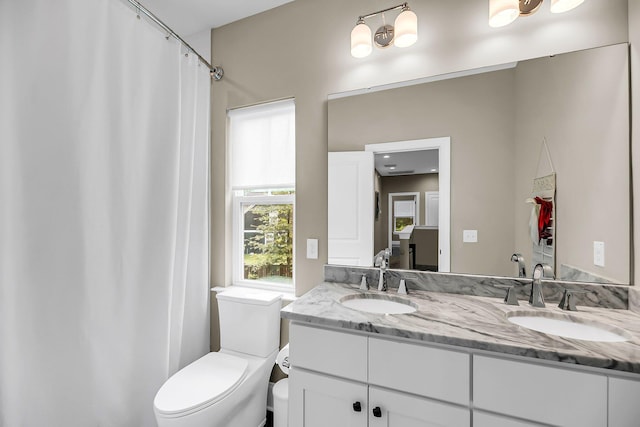 5725 Caviar Ct, Johns Island, SC 29455 - full bath featuring double vanity, toilet, and a shower with curtain