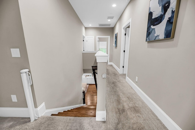 5725 Caviar Ct, Johns Island, SC 29455 - hallway featuring carpet flooring, baseboards, an upstairs landing, and recessed lighting