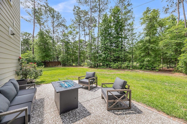 5725 Caviar Ct, Johns Island, SC 29455 - view of patio featuring an outdoor living space with a fire pit and view of wooded area