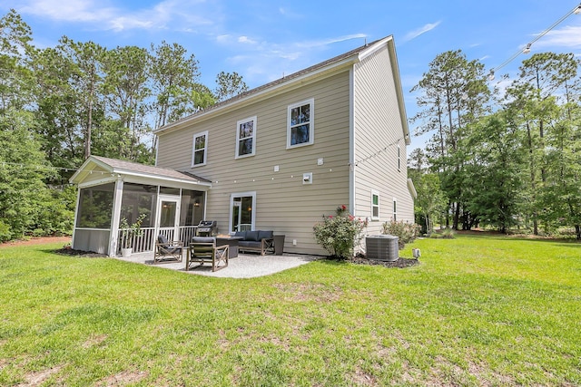 5725 Caviar Ct, Johns Island, SC 29455 - back of house with an outdoor living space, a sunroom, a patio area, and a lawn