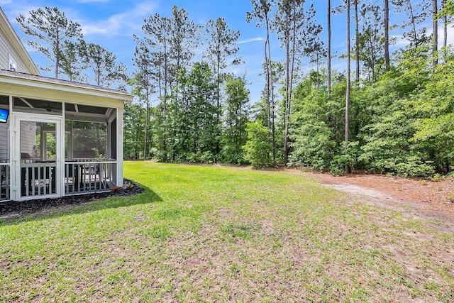 5725 Caviar Ct, Johns Island, SC 29455 - view of grassy yard with a sunroom and a ceiling fan