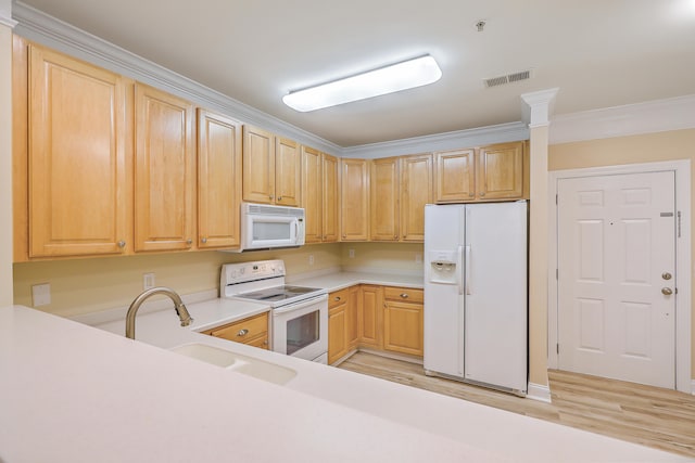 kitchen featuring light hardwood / wood-style floors, ornamental molding, sink, light brown cabinets, and white appliances