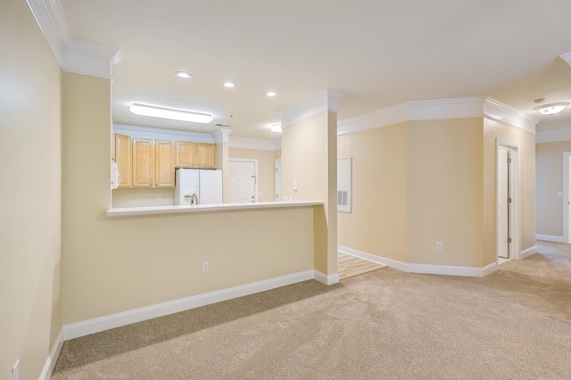 unfurnished living room with light colored carpet and crown molding