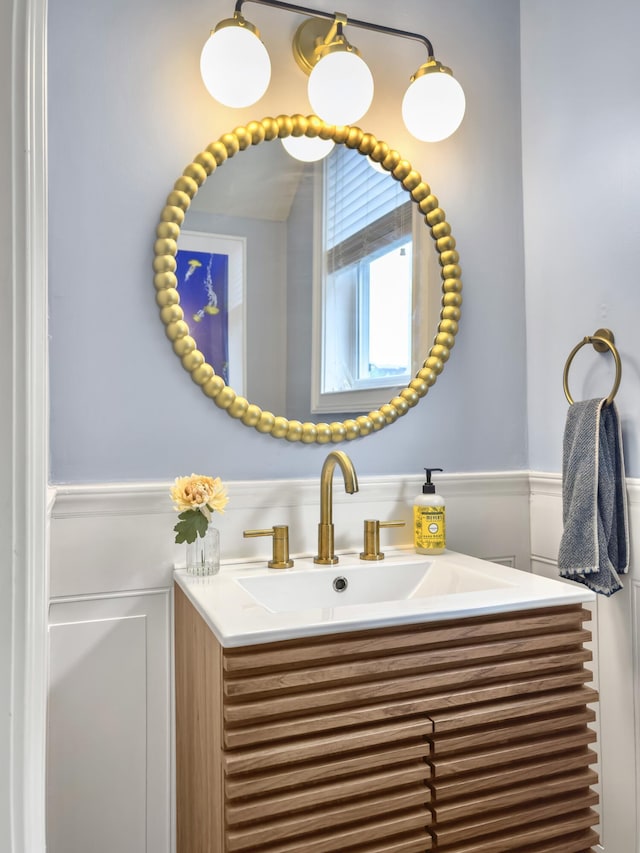 4 Line St, Charleston, SC 29403 - bathroom featuring vanity and wainscoting