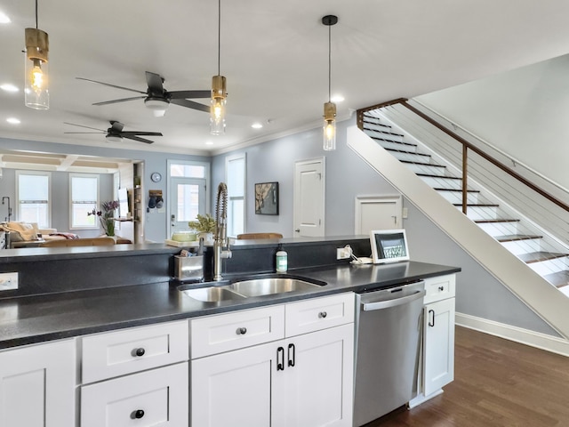 4 Line St, Charleston, SC 29403 - kitchen featuring dishwasher, dark countertops, crown molding, open floor plan, and white cabinetry