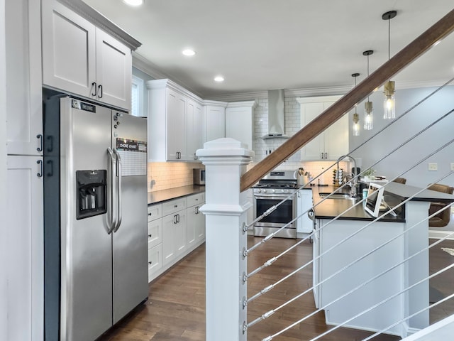4 Line St, Charleston, SC 29403 - kitchen with stainless steel appliances, wall chimney exhaust hood, dark countertops, backsplash, and ornamental molding