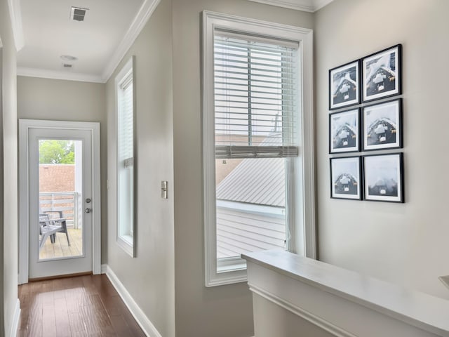 4 Line St, Charleston, SC 29403 - entryway featuring crown molding and dark wood-style floors