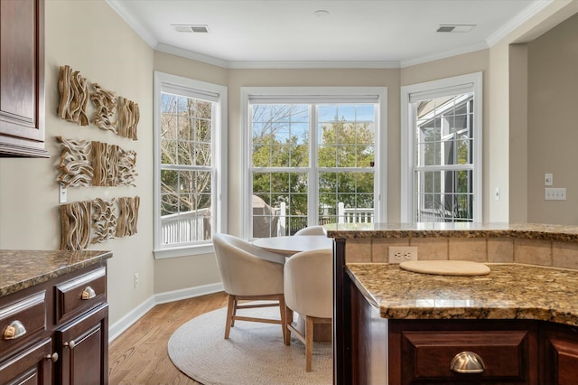 sunroom / solarium with visible vents