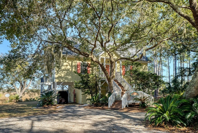 view of front of home with a carport