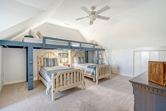 bedroom with light carpet, lofted ceiling, and ceiling fan