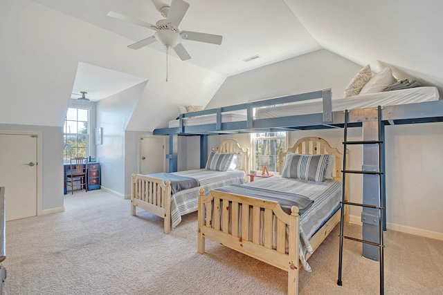 bedroom with vaulted ceiling, light carpet, and ceiling fan