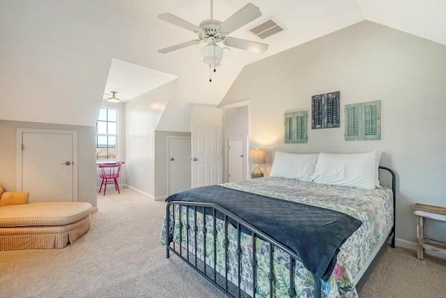 bedroom with lofted ceiling, carpet floors, and ceiling fan