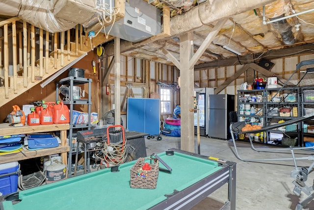 interior space featuring stainless steel refrigerator