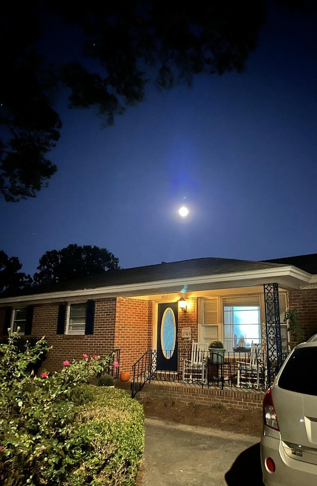 5937 Willard Dr, Hanahan, SC 29410 - ranch-style home featuring brick siding and a porch