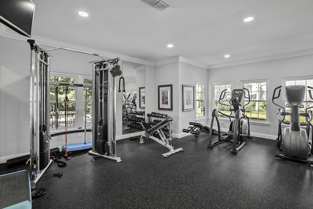 gym with baseboards, recessed lighting, visible vents, and crown molding