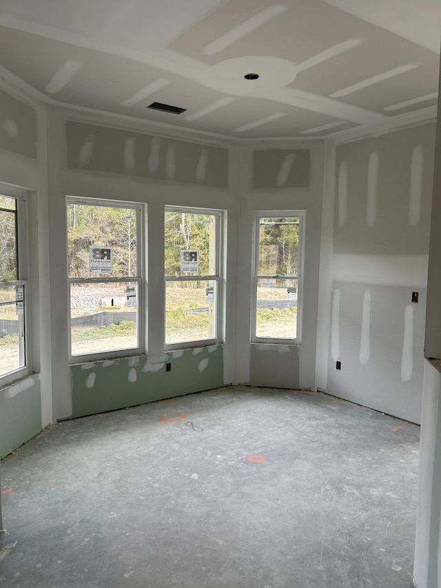 unfurnished sunroom with visible vents