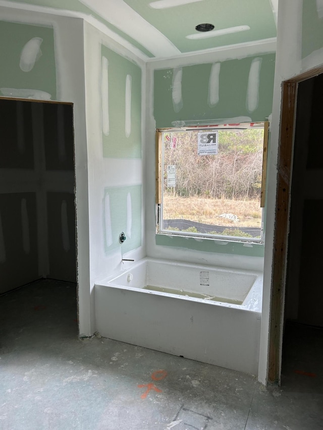 bathroom with a bath