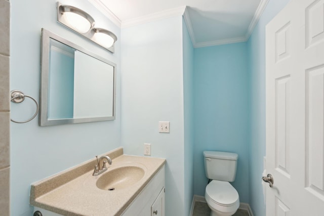 half bath with toilet, baseboards, vanity, and crown molding