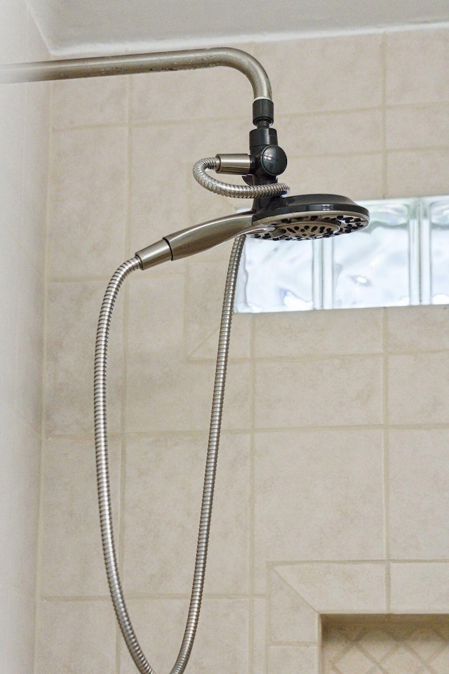 room details with a tile shower