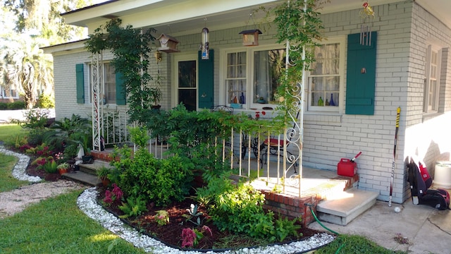 doorway to property featuring a porch