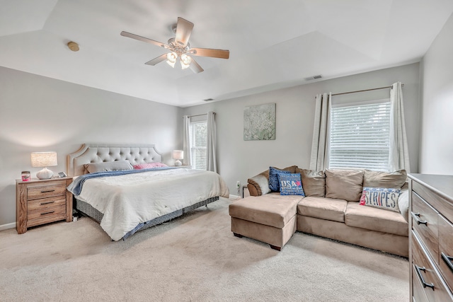 carpeted bedroom with ceiling fan