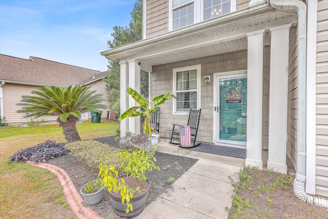 entrance to property with covered porch