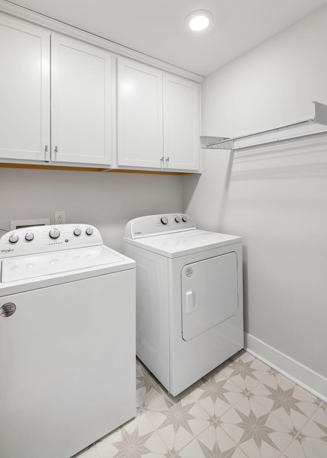 411 Katies Scenic Ct, Wando, SC 29492 - laundry room with washer and dryer, cabinet space, light floors, and baseboards