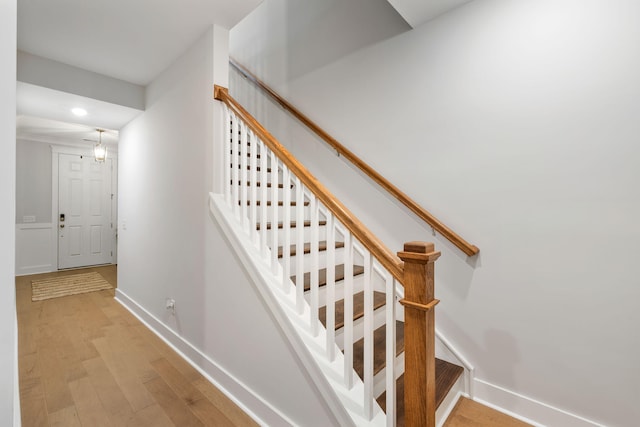 411 Katies Scenic Ct, Wando, SC 29492 - staircase with wood finished floors, baseboards, and recessed lighting
