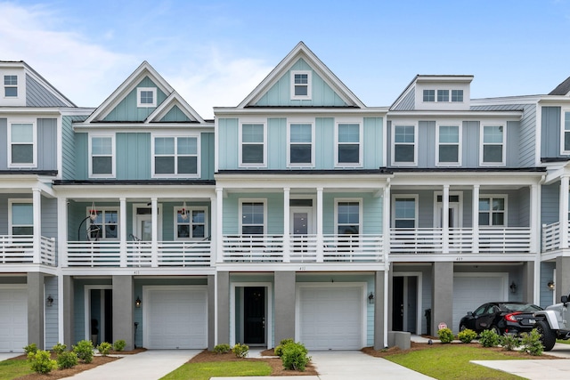 411 Katies Scenic Ct, Wando, SC 29492 - multi unit property with an attached garage, driveway, and board and batten siding
