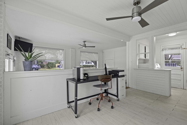 office with a wealth of natural light, ceiling fan, and wood finished floors