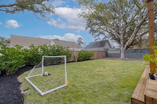 view of yard with a fenced backyard