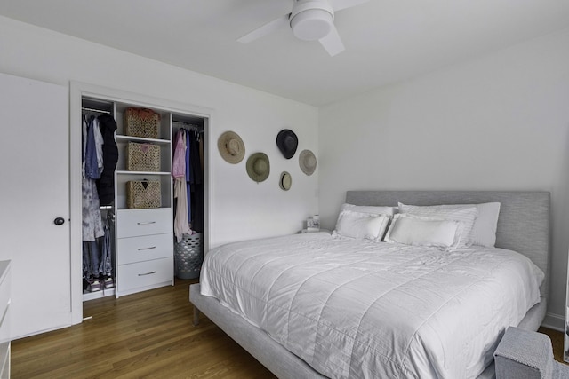 bedroom featuring a closet, wood finished floors, and a ceiling fan