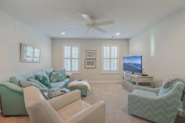 living area featuring baseboards, visible vents, a ceiling fan, carpet, and recessed lighting