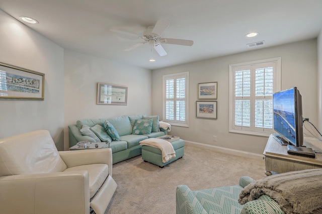 carpeted living room featuring baseboards, visible vents, ceiling fan, and recessed lighting