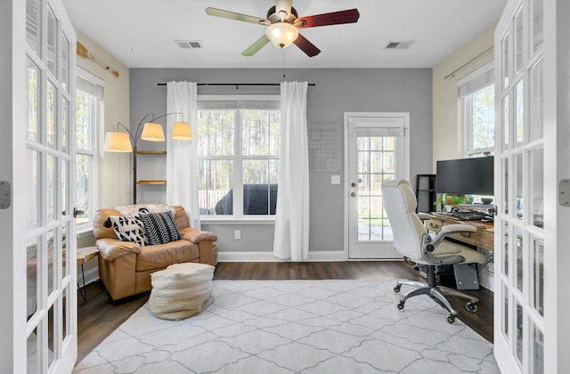 office space with wood-type flooring, ceiling fan, and french doors