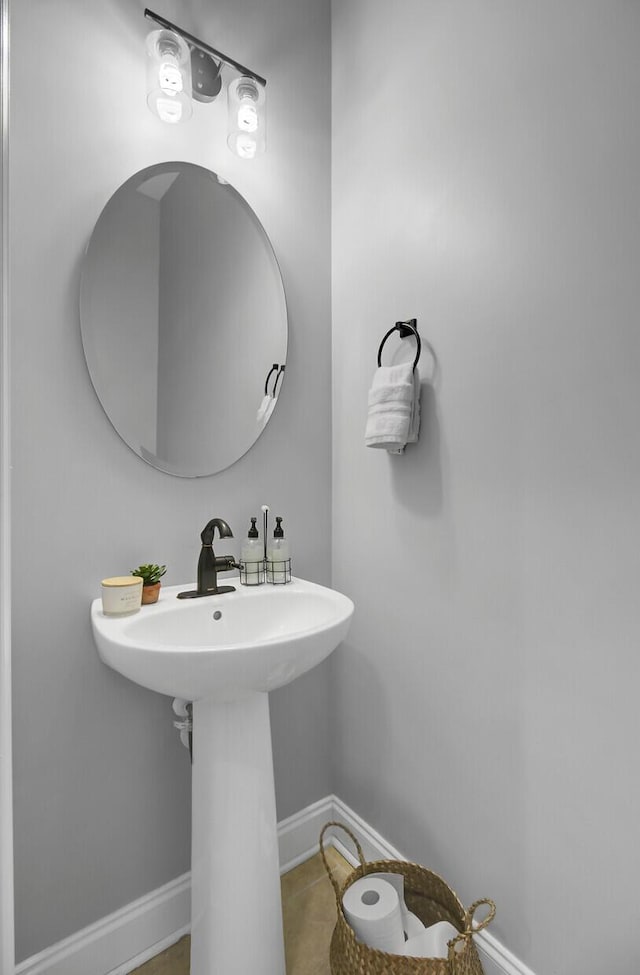 bathroom with tile patterned flooring