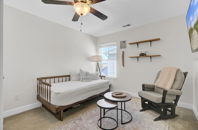 carpeted bedroom featuring ceiling fan