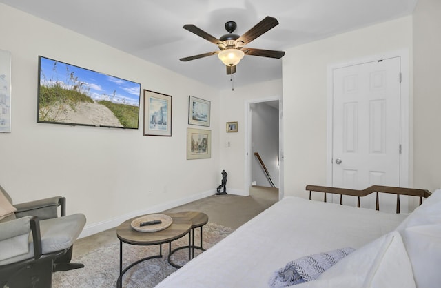 bedroom with ceiling fan and carpet flooring