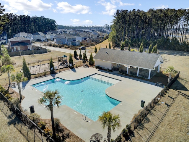 view of swimming pool featuring a patio area