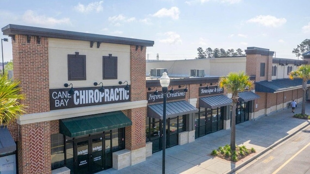 view of building exterior featuring central air condition unit