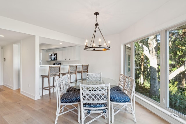 1505 Marsh Hvn, Johns Island, SC 29455 - dining room featuring light wood-style floors, a chandelier, baseboards, and recessed lighting