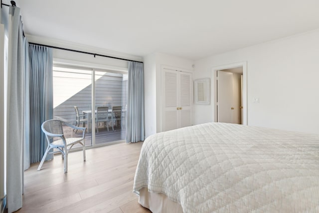 1505 Marsh Hvn, Johns Island, SC 29455 - bedroom featuring access to exterior, light wood-style floors, and a closet