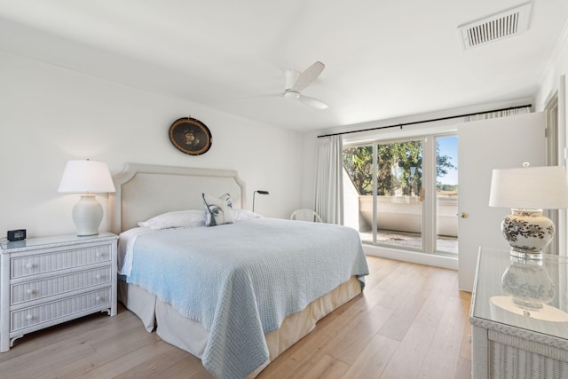 bedroom with access to exterior, ceiling fan, and light hardwood / wood-style floors