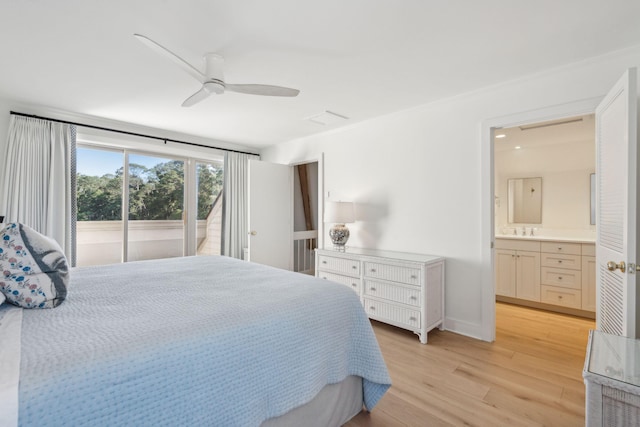 bedroom featuring access to outside, ensuite bathroom, sink, light hardwood / wood-style flooring, and ceiling fan