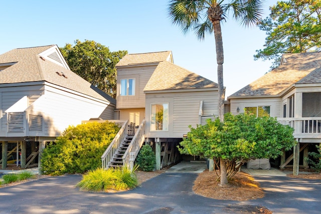 1505 Marsh Hvn, Johns Island, SC 29455 - beach home featuring stairs, a carport, asphalt driveway, and a shingled roof