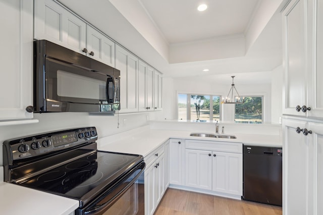 1505 Marsh Hvn, Johns Island, SC 29455 - kitchen featuring black appliances, a sink, white cabinetry, light countertops, and recessed lighting