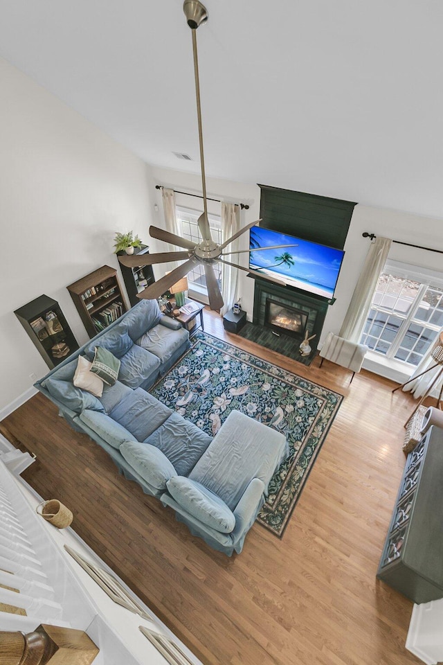 living room with wood finished floors and plenty of natural light