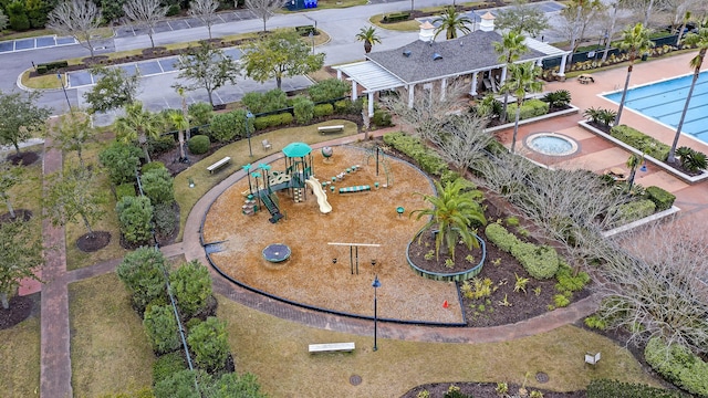 drone / aerial view of a pool