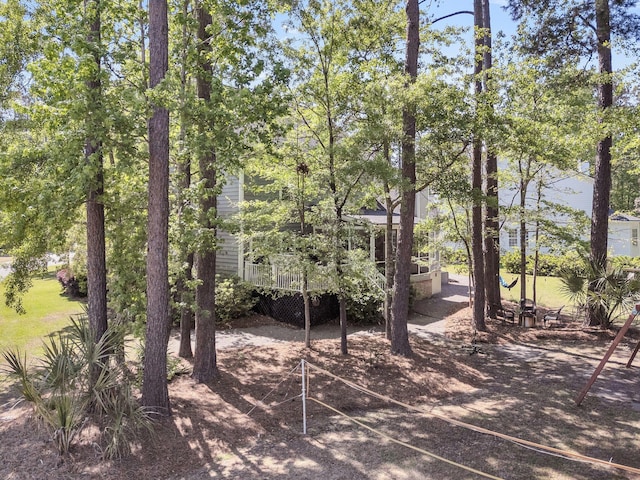 view of yard featuring a wooden deck