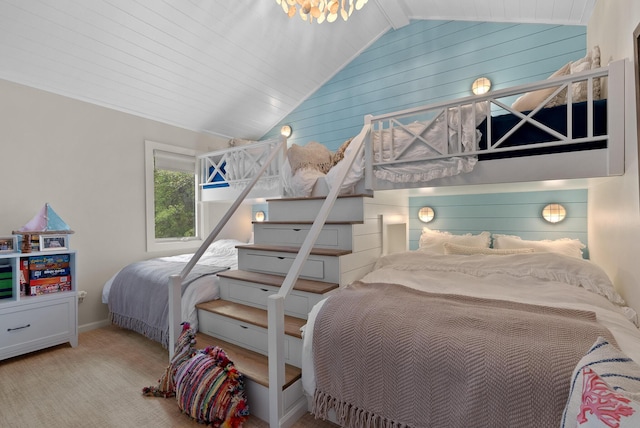 bedroom with wooden walls and lofted ceiling